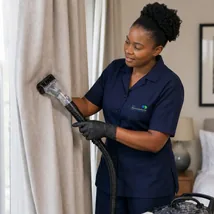 Curtains and fabric blinds being professionally cleaned