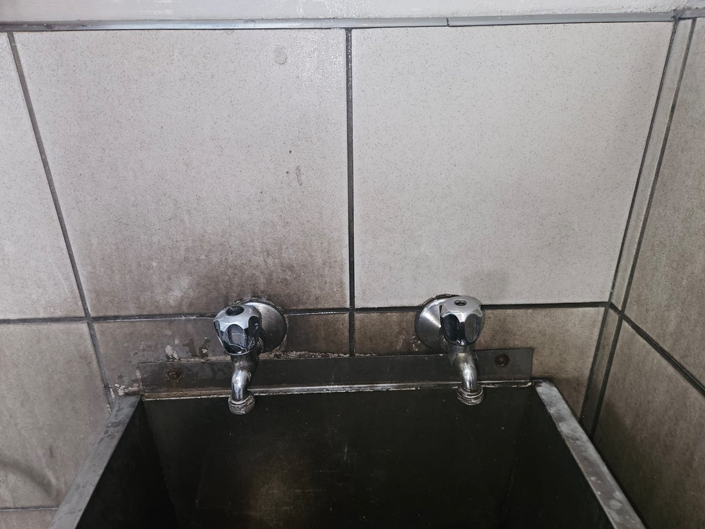 Grease and carbon stripped from a scullery sink