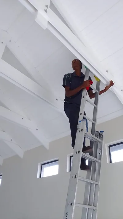 High interior walls reached safely by ladder