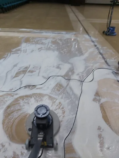 Rotary scrubber working foam through stubborn grime